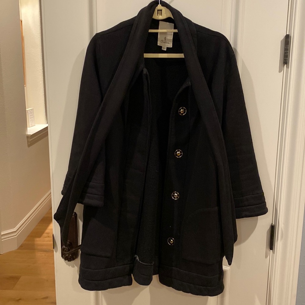 Seaton black jacket with 3/4 length flared sleeve and tie neck